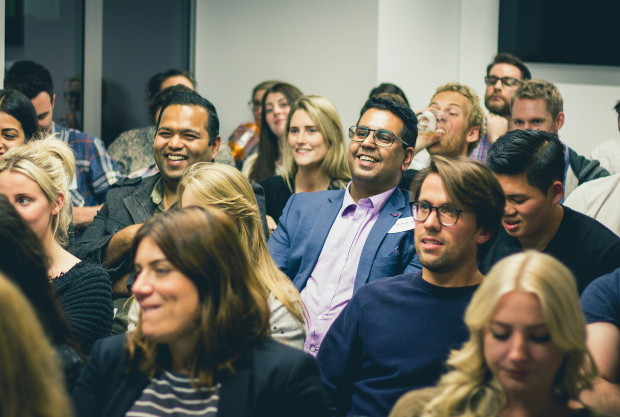 An audience of people at a business conference