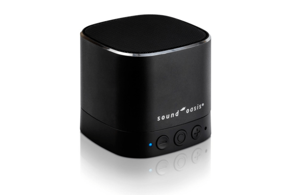 A curved, black cuboid speaker with volume buttons, and the text: 'sound oasis' on the front. 