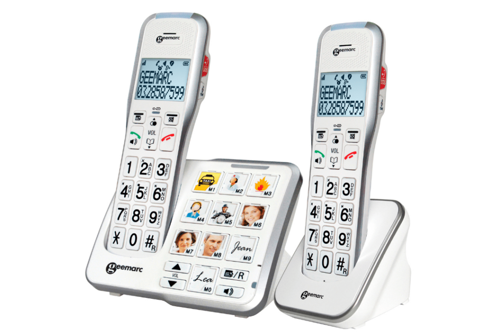 A pair of white, cordless hand-held phones with a screen on each one. The console the phones slot into has additional buttons with images on them, including a taxi, a nurse, a fire, and different people's faces. 