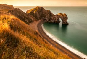 Durdle Door on the Dorset coast of England at sunset